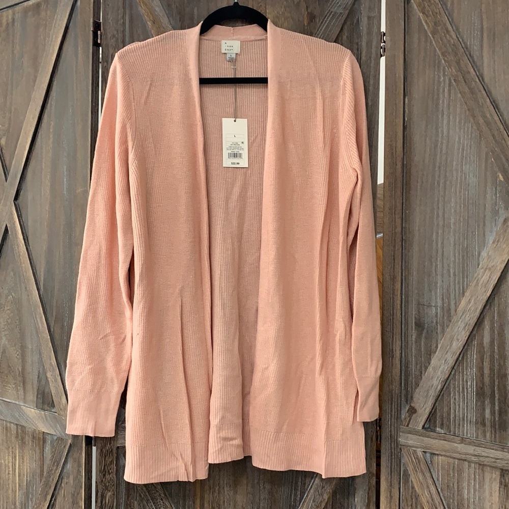 New with tags peach cardigan size L